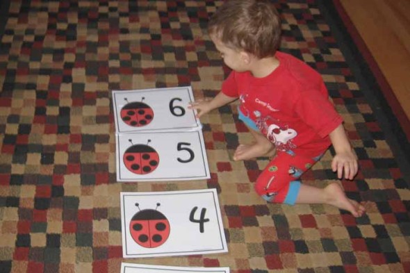 child with large floor numbers