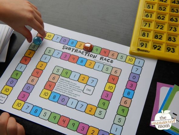 child playing subtraction game