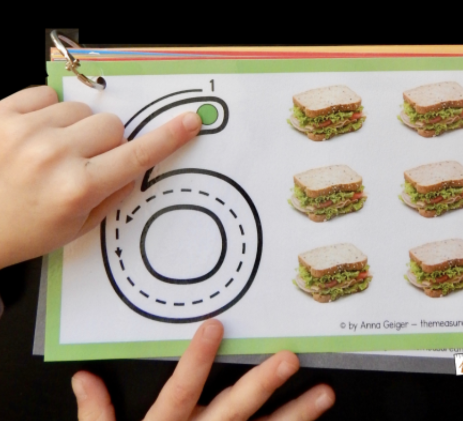 Number tracing at the light table! You can find these number cards on